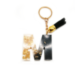 Schlüsselanhänger Buchstaben aus Resin in schwarz und gold